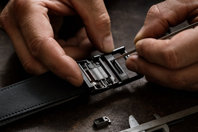 The buckle opened, showing the internal locking mechanism