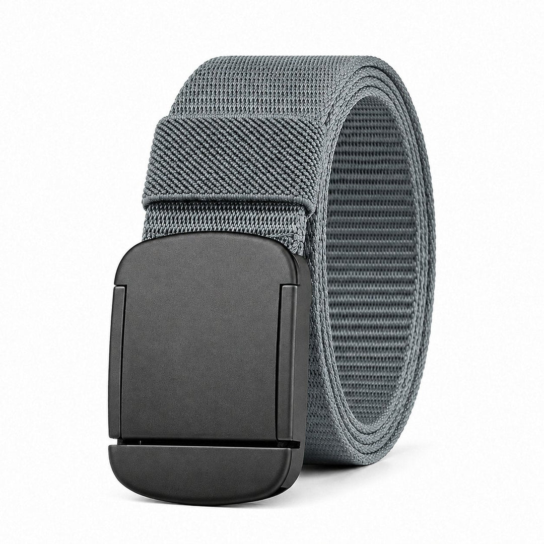 The Everyday Belt in grey, coiled, on a white background