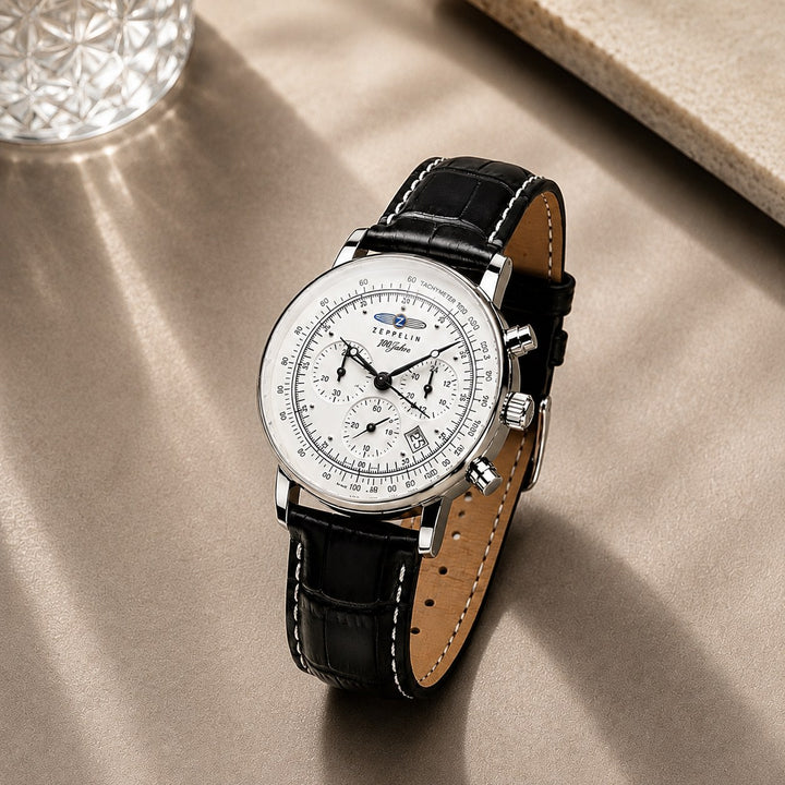 The Aviator Chronograph resting on a stone surface in daylight
