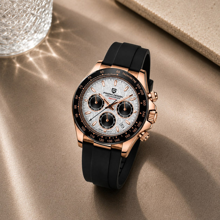The Racing Chronograph resting on a stone surface in daylight