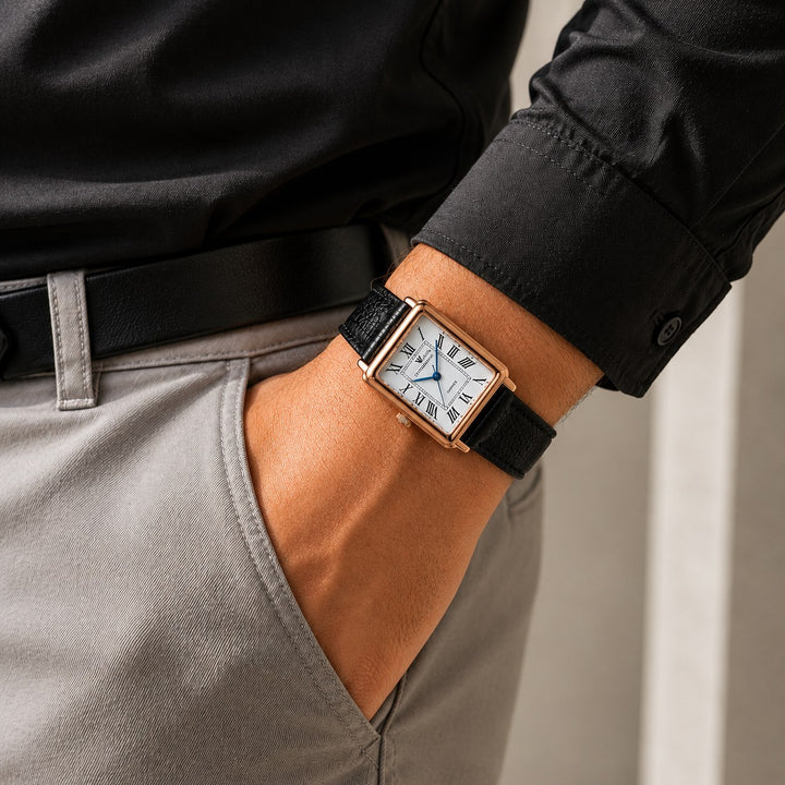 The Rectangle Watch worn on the wrist under a black shirt cuff