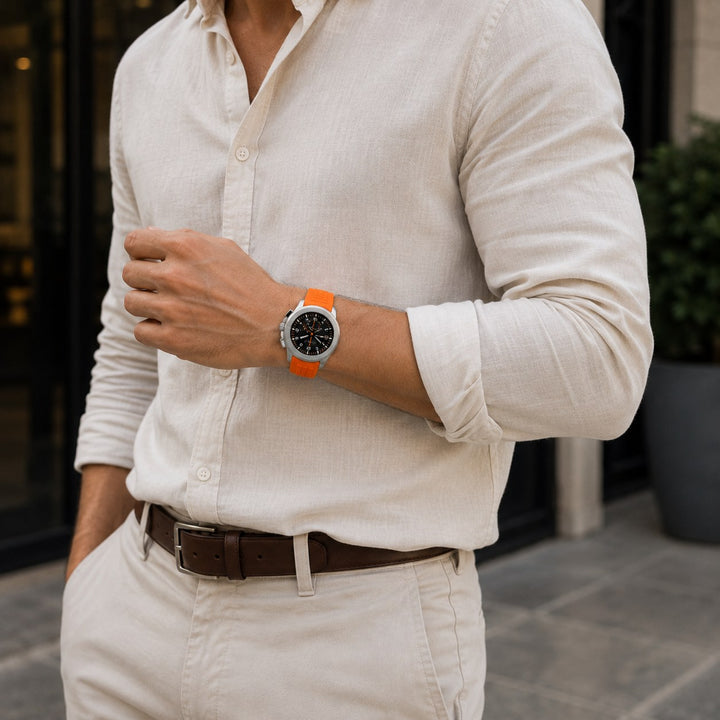 The Sport Chronograph worn on the wrist with a linen shirt