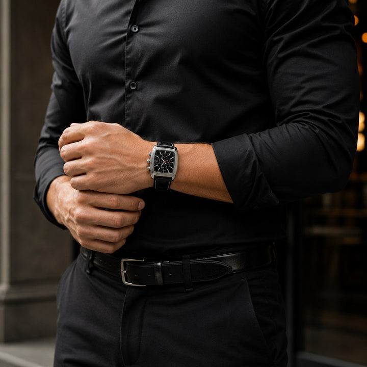 The Tonneau Chronograph worn with a black shirt, arms folded